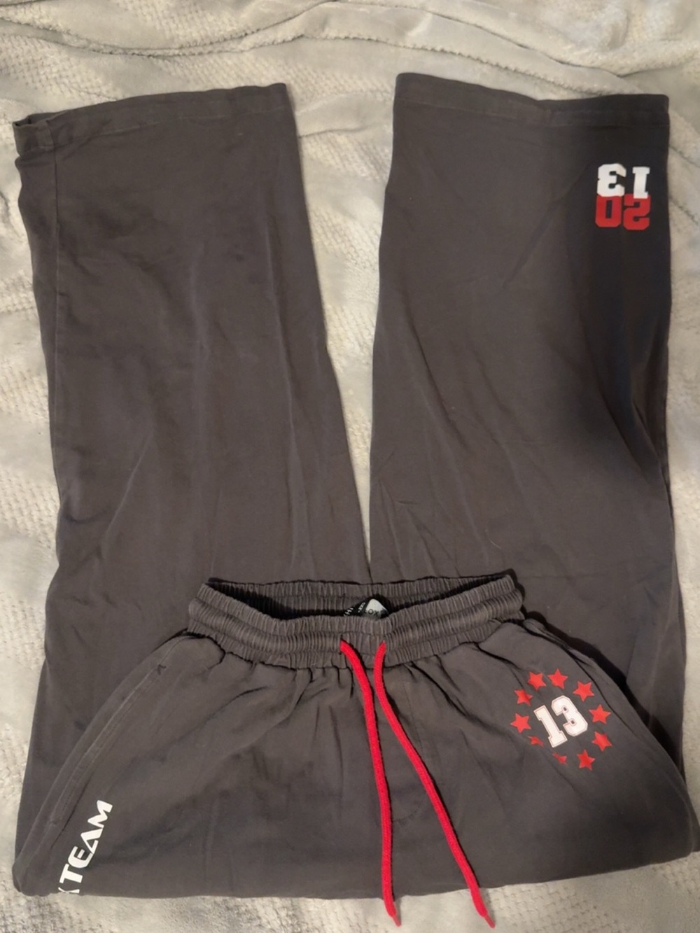White fox grey and red sweatpants
